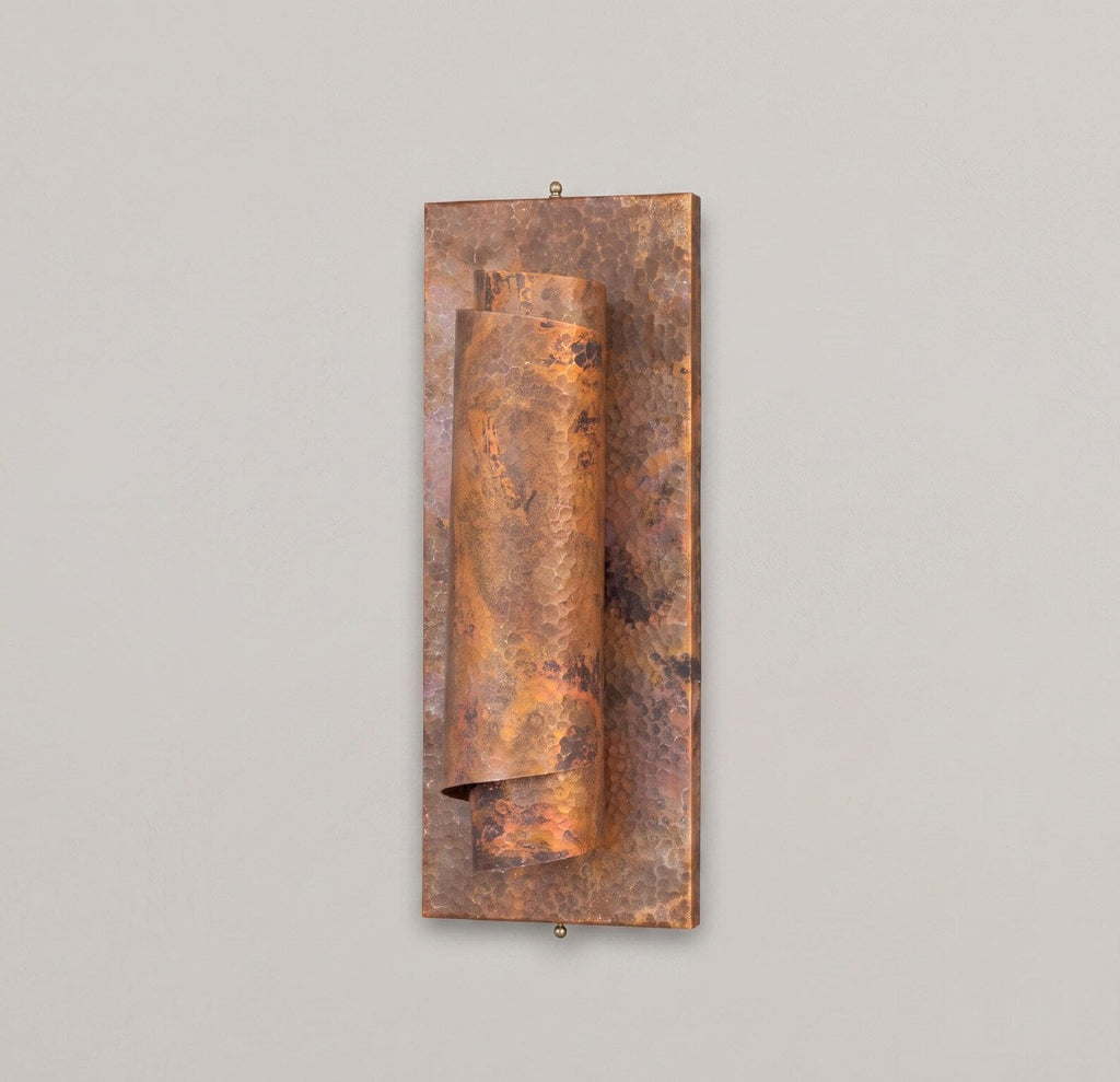 Full view of the antique hammered copper wall sconce with rectangular backplate