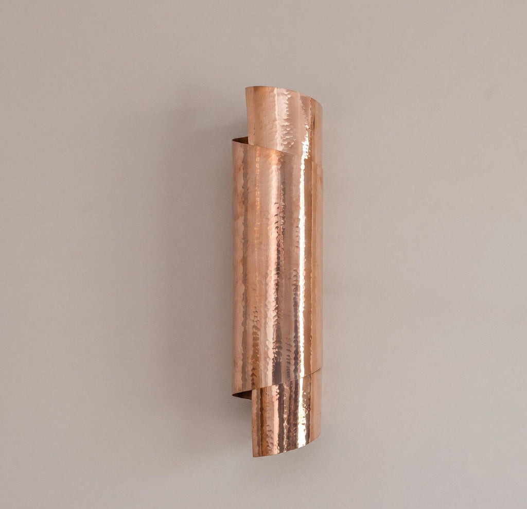 Full view of the layered curved copper wall sconce
