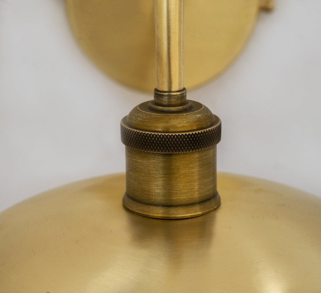 Detail of the brass socket fitting and brushed shade