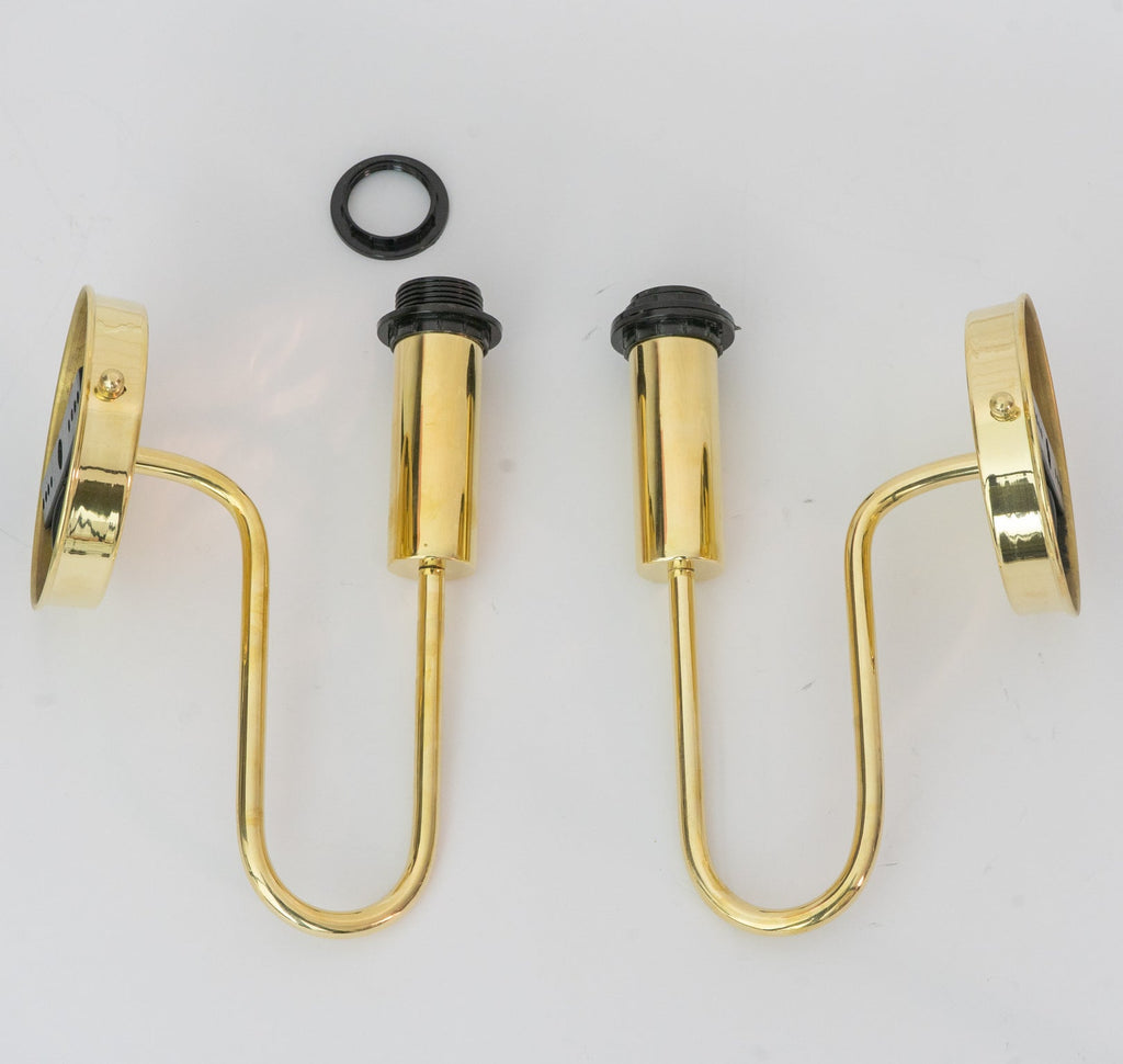 Brass wall sconce frames showing the curved arms and mounting plates