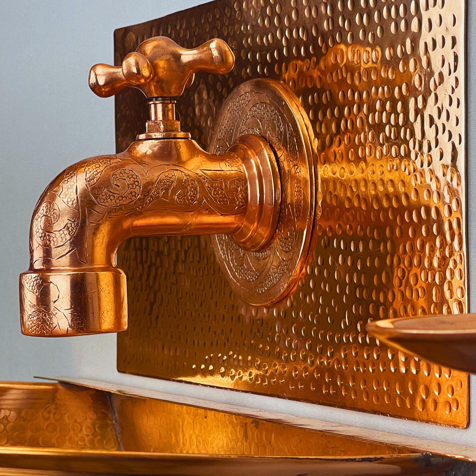 Hand-Hammered Copper Wall-Mounted Sink