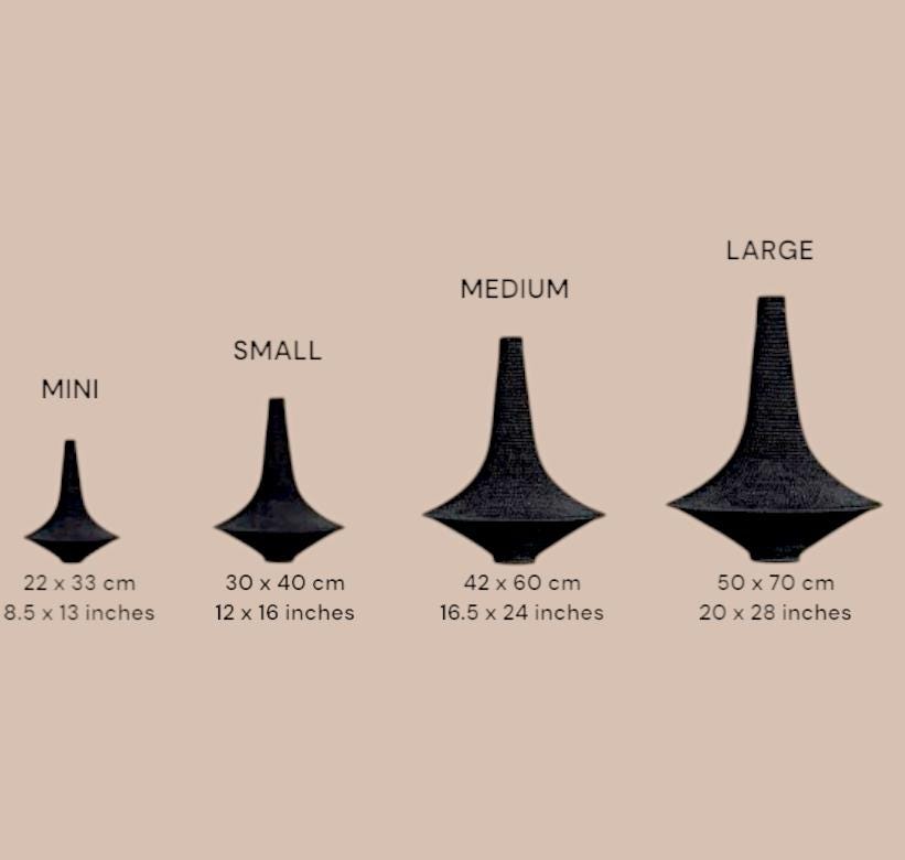 Four black vases with a textured surface, arranged by size from mini to large. The mini vase is 8.5 x 13 inches, small is…