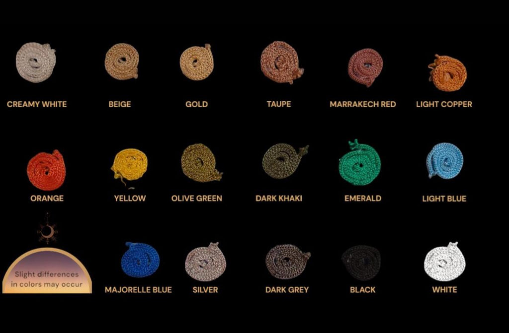 A collection of seventeen coiled cords in various colors including creamy white, beige, gold, taupe, marrakech red, light…